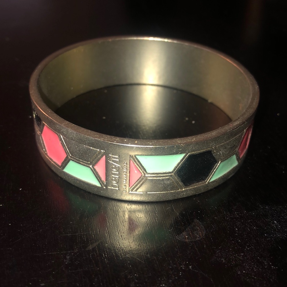 Benefit Cosmetics bangle staff item.